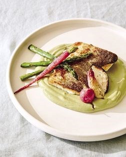 Pan-seared branzino with lima bean-avocado puree and tarragon-mint sauce