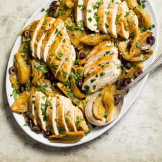 Pan-seared chicken breasts with braised fennel, olives, and orange