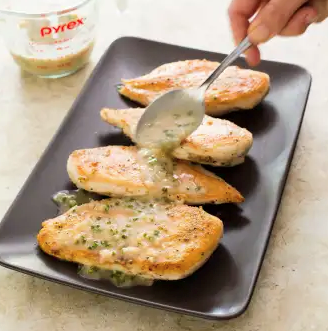 Pan-seared chicken breasts with lemon and chive pan sauce