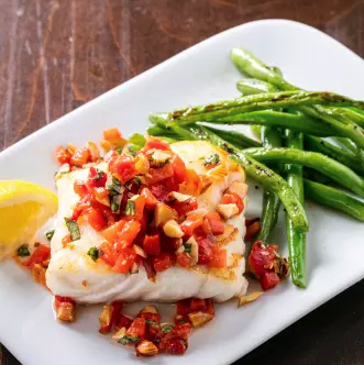 Pan-seared cod with blistered green beans and red pepper relish