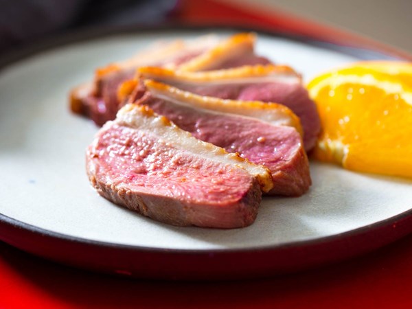 Pan-seared duck breast with orange pan sauce