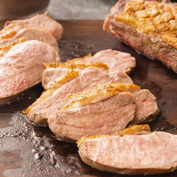 Pan-seared duck breasts with dried cherry sauce