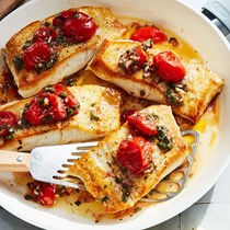 Pan-seared fish with basil oil and cherry tomato vinaigrette 