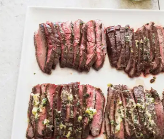 Pan-seared flank steak with mustard-chive butter