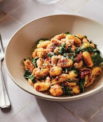 Pan-seared gnocchi with spinach and white beans