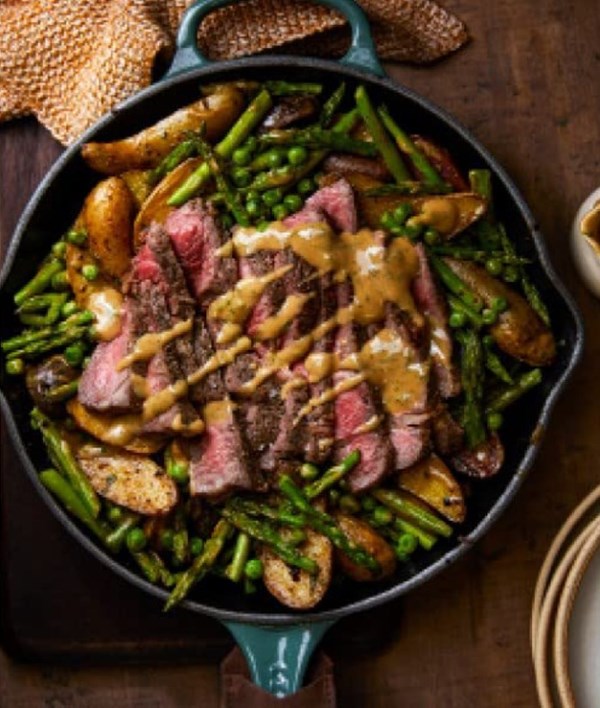 Pan-seared New York steak with tarragon mustard and spring vegetables