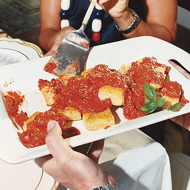 Pan-seared polenta with spicy tomato-basil sauce