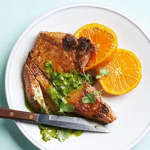 Pan-seared pork chops with cilantro pesto