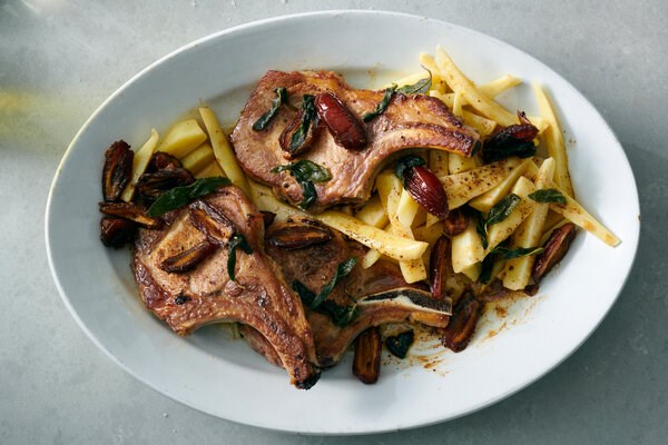 Pan-seared pork chops with sage, dates and parsnips