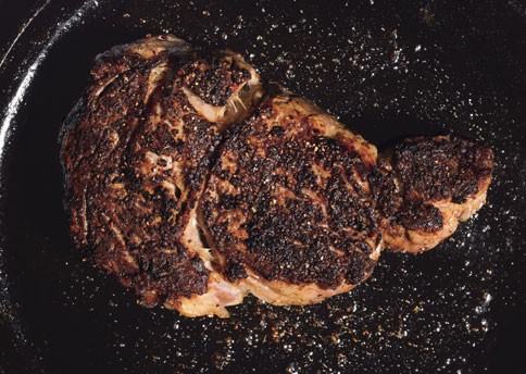 Pan-seared rib-eye steaks with porcini and rosemary rub