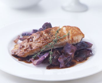 Pan-seared salmon over red cabbage and onions with Merlot gastrique
