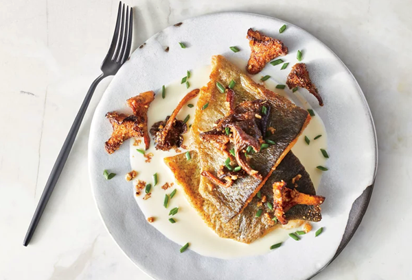 Pan-seared trout with green garlic and crunchy chanterelles