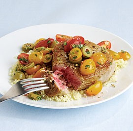 Pan-seared tuna steaks with warm tomato, basil, and olive salad