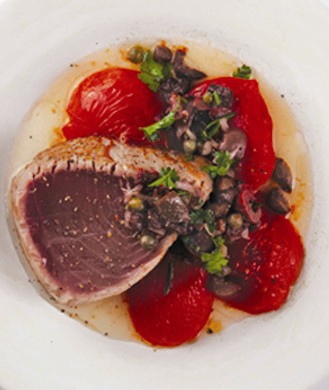 Pan-seared tuna with olive vinaigrette and roasted tomatoes