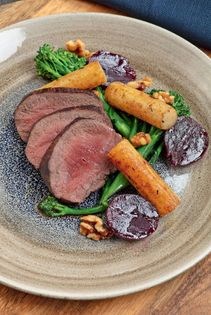 Pan-seared venison salad with beetroot, walnuts, broccoli & tarragon, & duck-fat potatoes