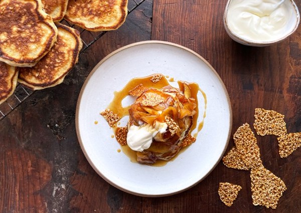 Pancakes with maple brown butter apples and sesame praline