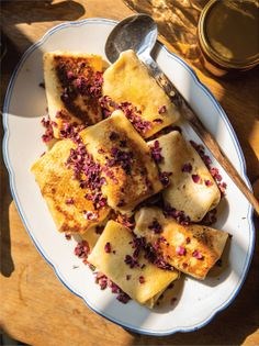 Pancakes with white cheese and rose (Naleśniki)