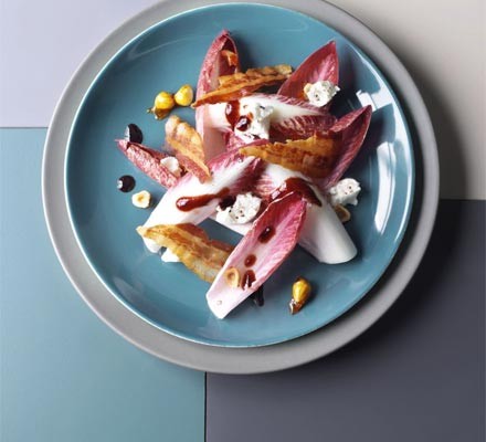 Pancetta, goat's cheese and chicory salad with hazelnuts