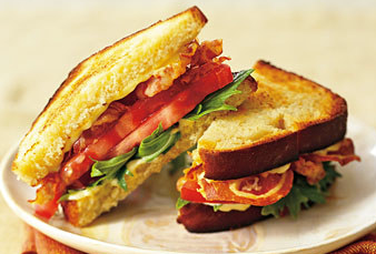 Pancetta, mizuna, and tomato sandwiches with green garlic aioli