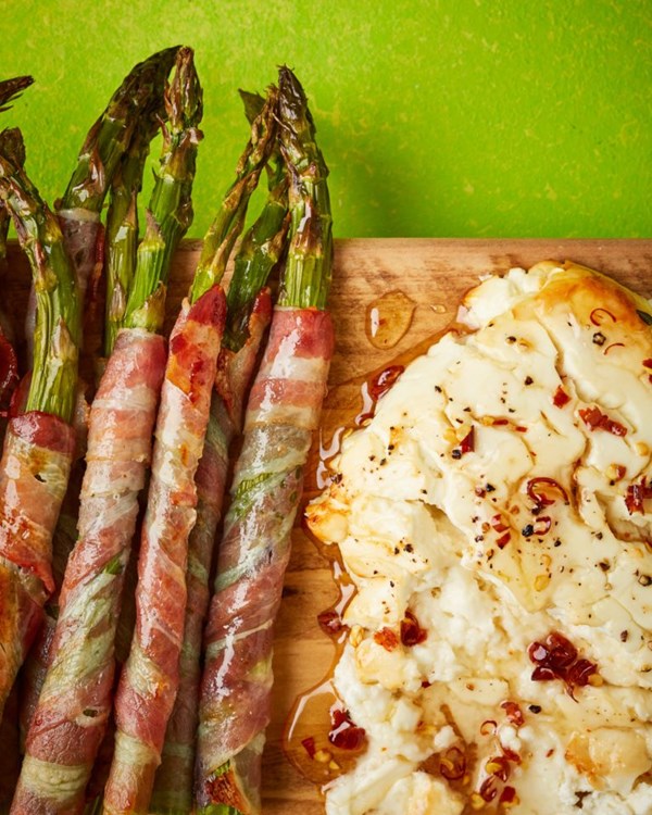 Pancetta-wrapped asparagus with baked feta and chilli honey