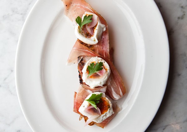 Pane pomodoro with burrata, speck, and pickled shallots