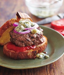 Panfried burgers stuffed with blue cheese