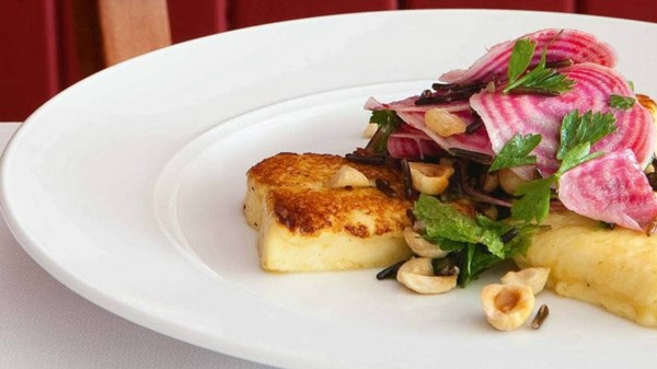 Panfried haloumi with Chioggia beetroot, roasted hazelnut and wild rice salad
