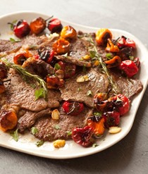 Panfried rib eye with roasted cherry peppers
