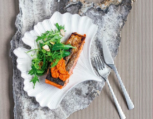 Panfried salmon with romesco & lemony herb & nut salad