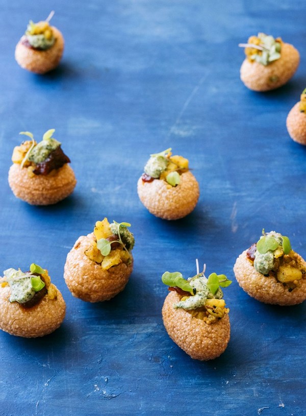 Pani puri with spiced potatoes and tamarind chutney