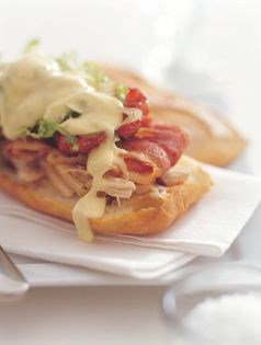 Panini of roast chicken, bacon, lettuce, tomato and aioli