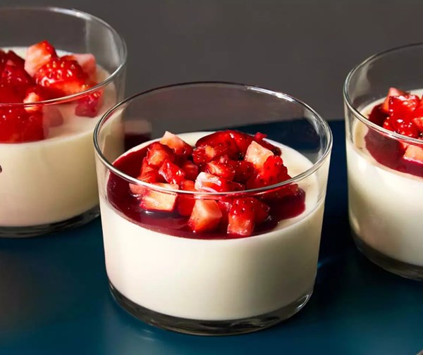 Panna cotta with strawberry, hibiscus & elderflower syrup