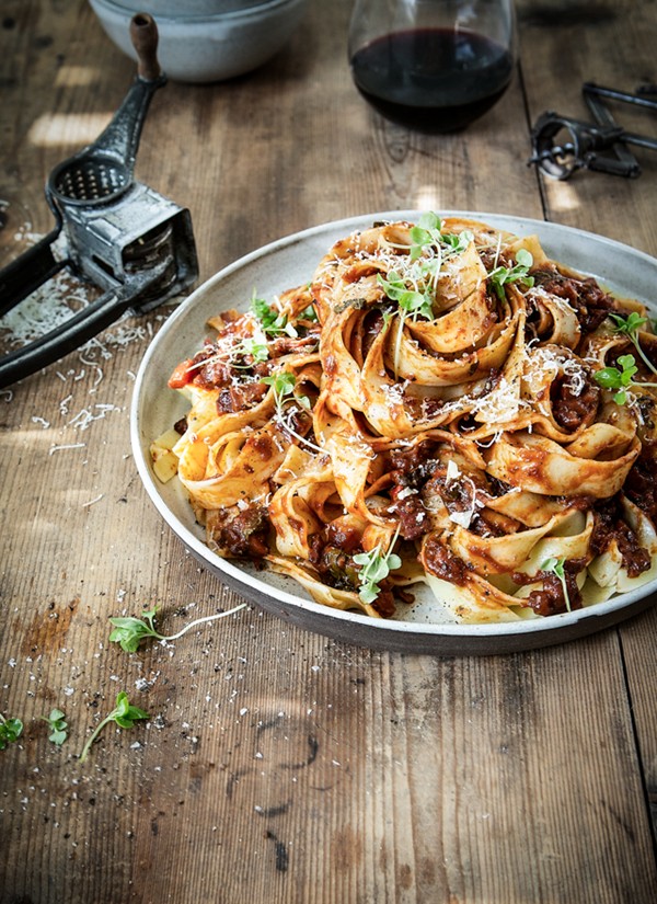 Pappardelle with fennel infused crispy pork belly and rich, spicy red wine sauce