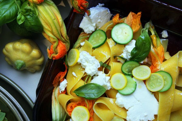 Pappardelle with fresh ricotta, squash blossoms and basil oil