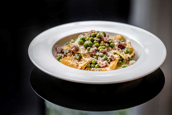 Pappardelle with Italian sausages, fresh peas and Parmesan