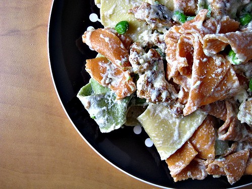 Pappardelle with smashed peas, sausage, and ricotta