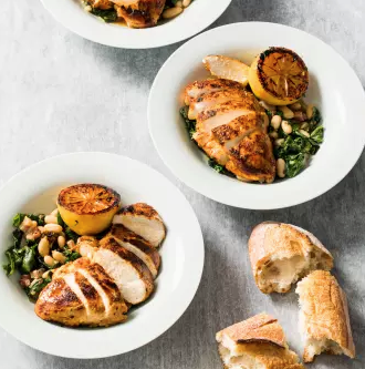 Paprika chicken with garlicky greens and white beans