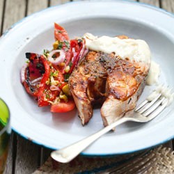 Paprika kingfish with saffron aioli and capsicum, olive and tomato salad