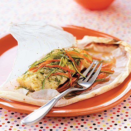 Parchment-baked halibut with pesto, zucchini, and carrots