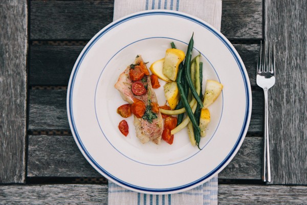 Parchment-roasted red snapper with tomatoes and zucchini