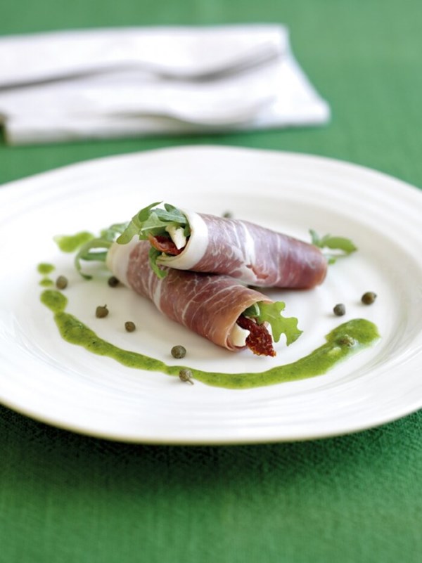 Parma ham, mozzarella and rocket roulades with basil vinaigrette