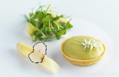 Parmesan and wild garlic tart with lemon, chicory and pea sprouts