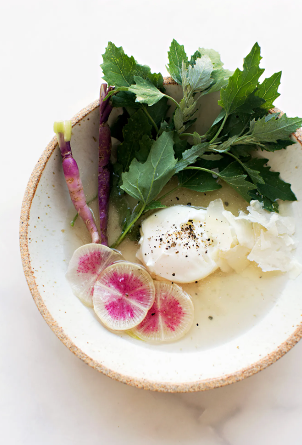 Parmesan brodo: egg, young spinach, radish