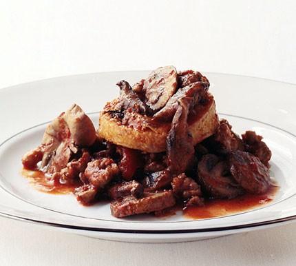 Parmesan-crusted polenta with sausage-mushroom ragout