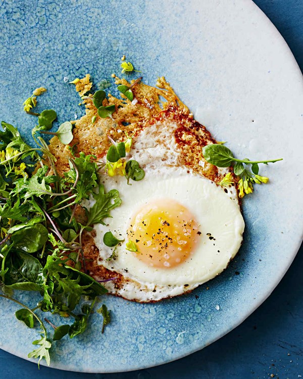 Parmesan fried eggs with bitter greens