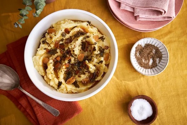 Parmesan mashed potatoes with crispy garlic & herb oil