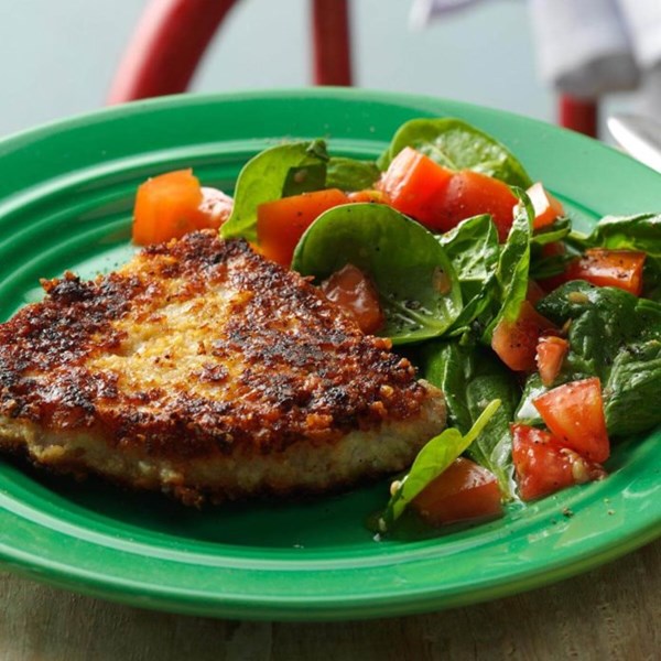 Parmesan pork chops with spinach salad