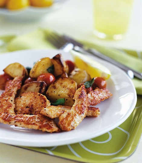 Parmesan turkey with roast tomato and basil potatoes 