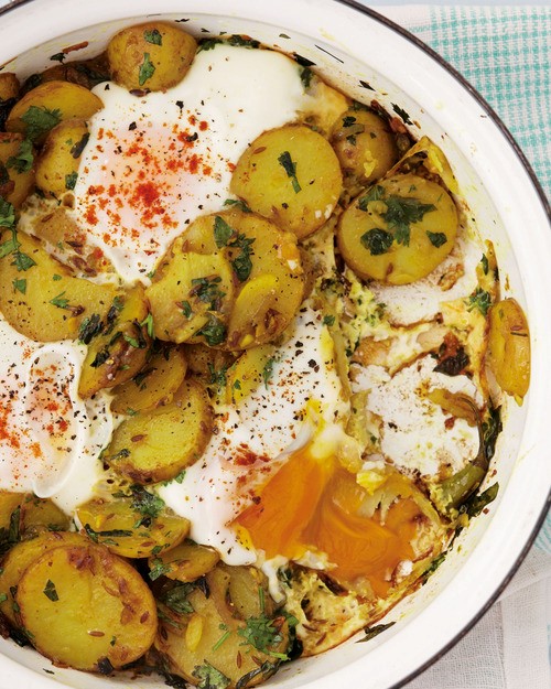Parsi poached eggs on potatoes