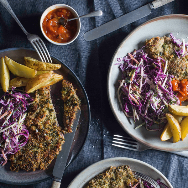 Parsley beef schnitzel with courgette, apple and carrot slaw